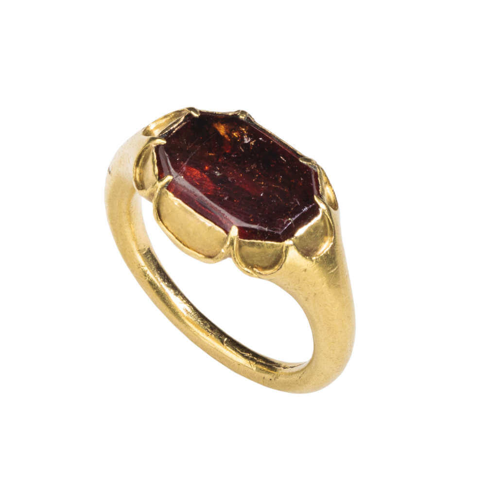 Cusped Ring. 15th century. North European. Gold, hessonite garnet. Height 26.4 mm.; hoop inner diam. 20 mm.; hoop outer diam. 26 mm.; bezel 19 x 13 mm.; weight 12.34 g. Griffin Collection L.2015.72.14.