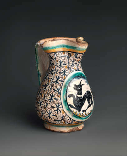 Jug. ca. 1480-1500. Italian, Florence or environs (probably Montelupo) Maiolica (tin-glazed earthenware). Overall: 6 15/16 × 4 1/2 in. (17.6 × 11.4 cm). Gift of J. Pierpont Morgan, by exchange, 1965 65.6.14.