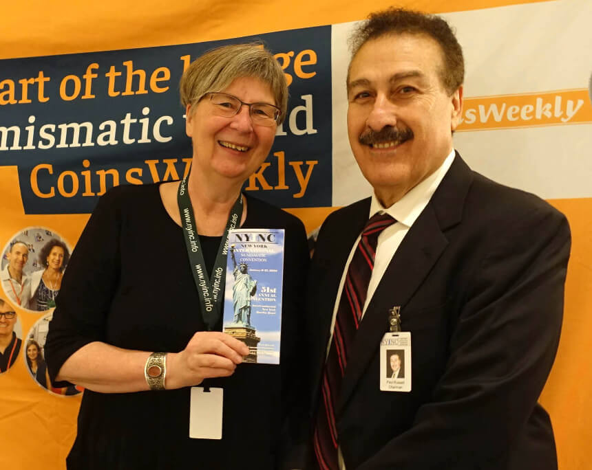 Paul Russell, NYINC Chairman, at the CoinsWeekly booth to take a mandatory picture with Ursula Kampmann. Photo: CoinsWeekly.