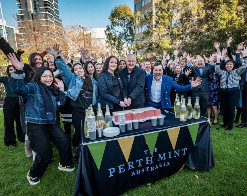 Birthday Celebration: Employees of the Perth Mint toast to the 125th anniversary. Photo: The Perth Mint.