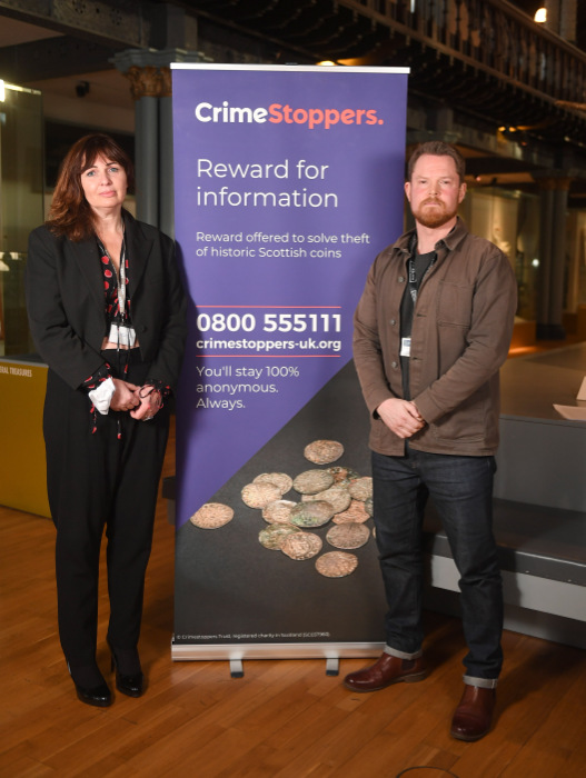 Angela Parker, Crimestoppers Scotland National Manager and Jesper Ericsson, Curator of Numismatics at The Hunterian, University of Glasgow